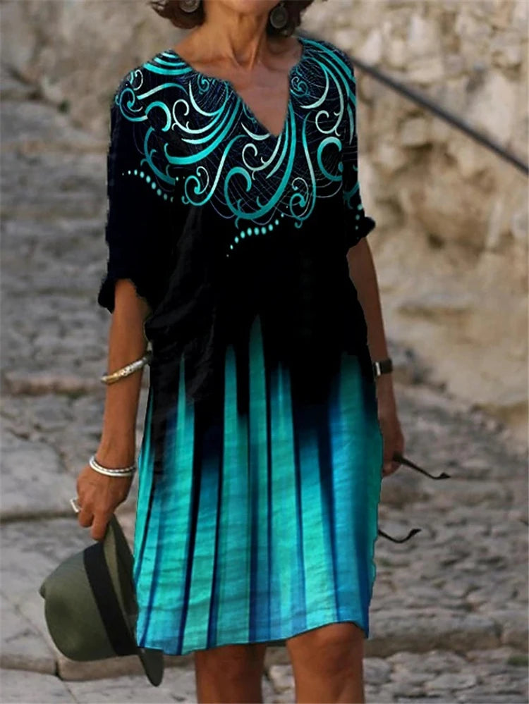 Vestido feminino de algodão com estampa floral colorida.